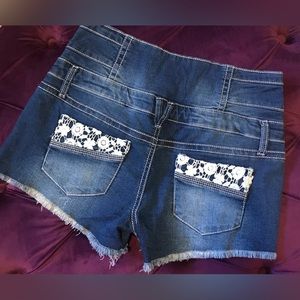 No Boundaries Denim High Waist Button Shorts with Floral Crochet Detail